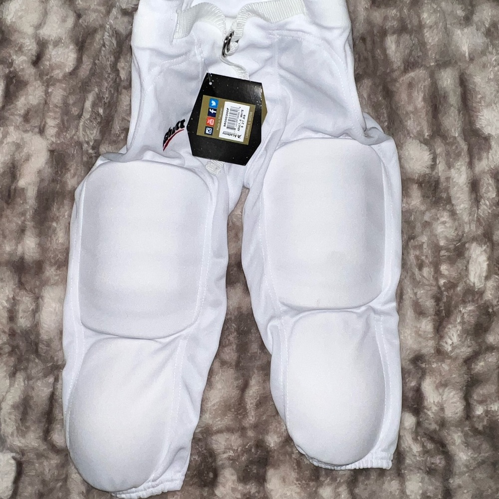 COPY - NWT.. Schutt Football Pants.. Size Adult Small - White in Color